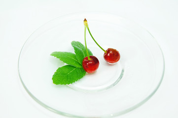 Fresh,red cherries isolated on transparent plate