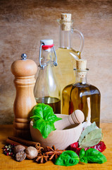 Obraz na płótnie Canvas Olive oil, herbs and spices