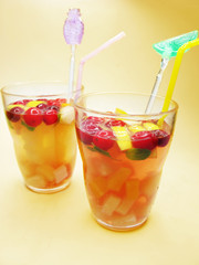 fruit punch cocktail drinks with cherry