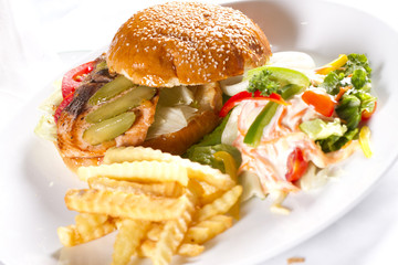 hamburger meal, a dish of hamburger with fries and salad