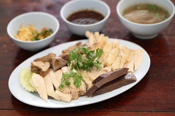 Thai food gourmet steamed chicken with rice , khao mun kai in wo