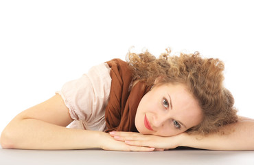 Fototapeta premium A tired woman lying on the desk