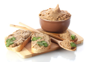 Fresh pate with bread on wooden board isolated on white