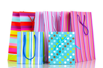 Colorful gift bags isolated on white