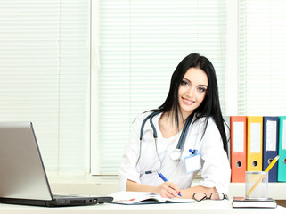 beautiful girl doctor in the office