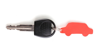 Car key with charm isolated on white