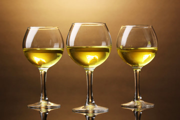 Wineglass on brown background