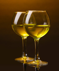 Wineglass on brown background