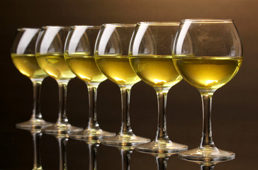 Wineglass on brown background