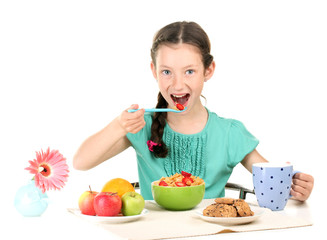 little beautiful girl have a breakfast on white background