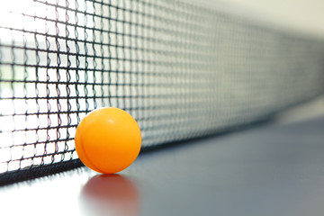 Orange table tennis ball