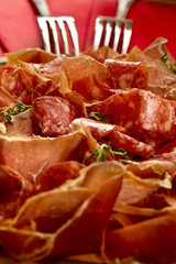Prosciutto and forks
