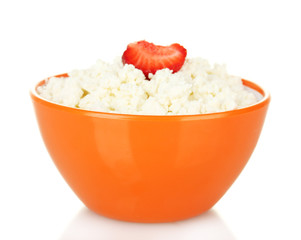 cottage cheese with strawberry in orange bowl isolated on white