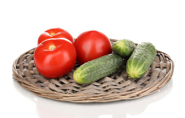 Ripe cucumbers and tomatoes isolated on white