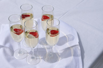 Glasses with champain and strawberries
