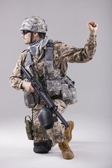 soldier with hand warning gesure