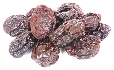 Dried prunes on white