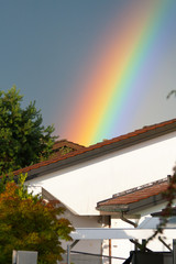 Fototapeta na wymiar Rainbow and House
