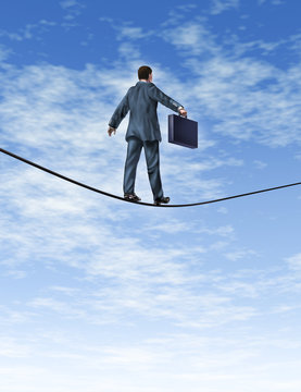 Business man Walking A Tightrope