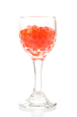 Red caviar in glass isolated on white