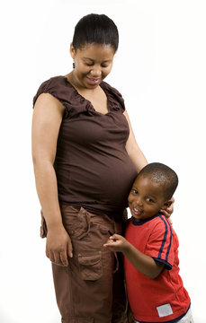 South African Pregnant Mother And Son In Studio