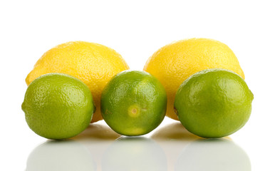 Fresh limes and lemons isolated on white