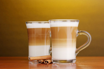 Fragrant сoffee latte in glass cups and cinnamon
