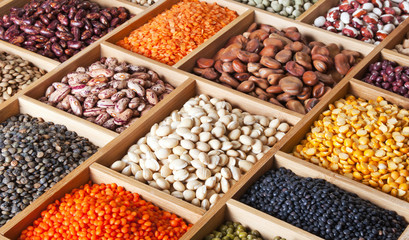 peas, beans and lentils in the wooden box