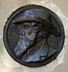 bas-relief with portrait of man