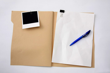 a file folder and pen, business concept