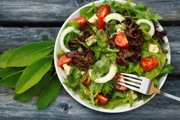 Fresh salad with tomatoes and cucumbers