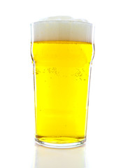 Glass with beer on white background
