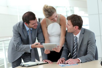 Group of business people meeting around table