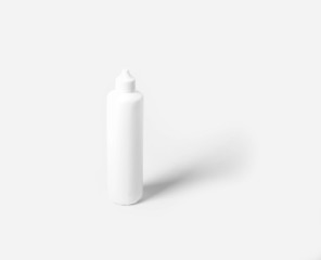 White plastic bottle on white background
