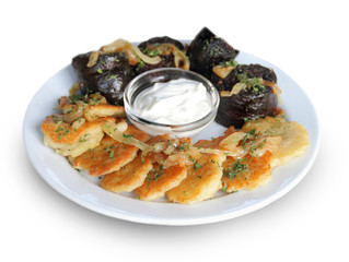 Potato pancakes with blood sausage and sour cream