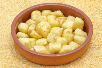 Fried pieces of potatoes
