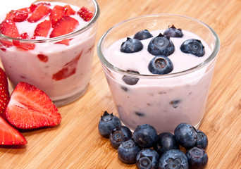Mixed Yoghurts on wooden background