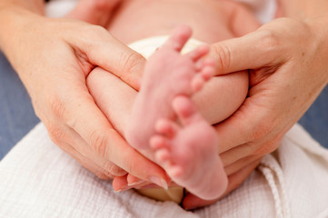 Holding Baby with Focus on Hands
