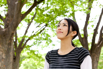 Fototapeta premium young asian woman relaxing in the forest