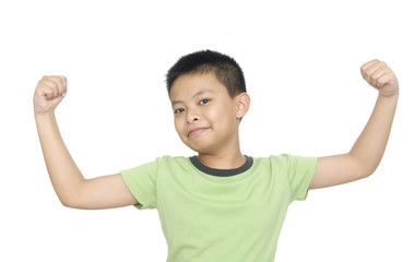 portrait of an innocent little boy flexing biceps
