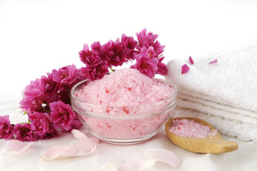 Obraz na płótnie Canvas spa set- towel and plum flower. candle on soap, salt in spoon