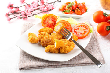 Chicken nuggets on dish