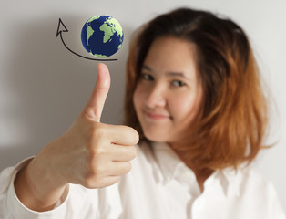 Fototapeta premium thumps up with high grow arrow sign with globe