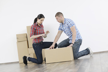 Young couple moving in new home