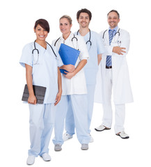 Group of doctors standing together over white