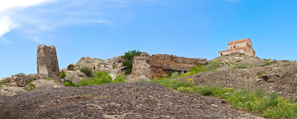 Fototapeta na wymiar panorama of ruins of cave-dwelling town Uplistsikhe