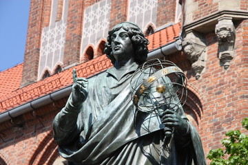 Nicolaus Copernicus statue in Torun - obrazy, fototapety, plakaty