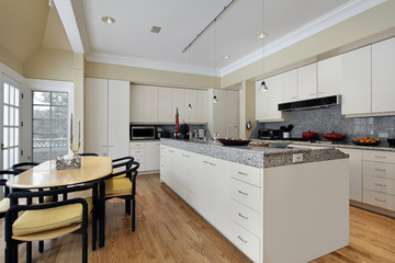 Kitchen with white cabinetry
