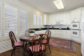 Kitchen with white cabinetry