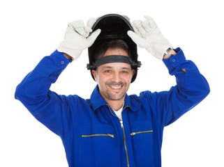 Portrait of confident welder in the mask